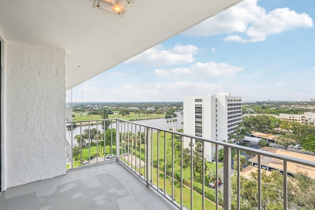 balcony featuring a water view