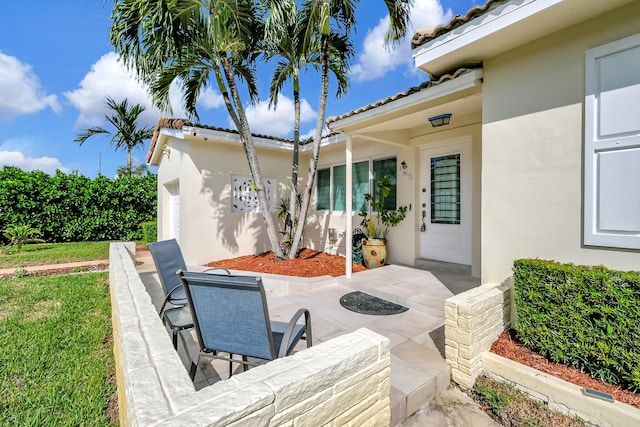 view of patio featuring a garage