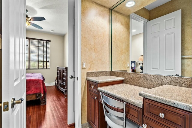 bedroom featuring ceiling fan and dark hardwood / wood-style floors