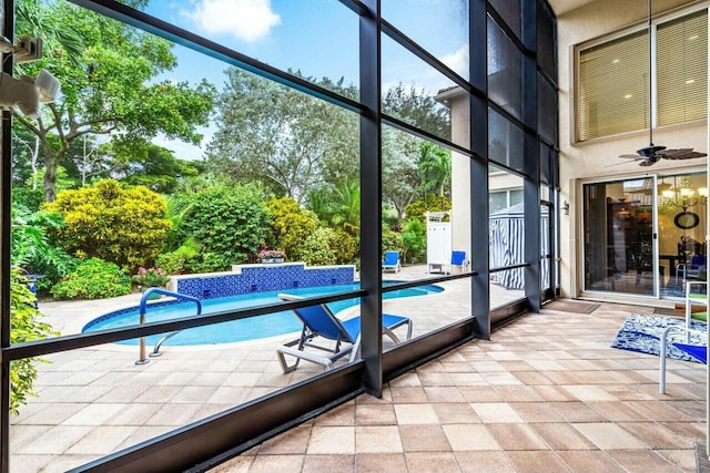 view of patio featuring ceiling fan