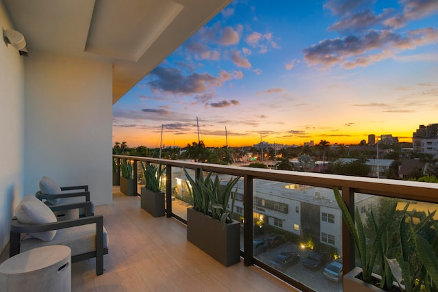 view of balcony at dusk