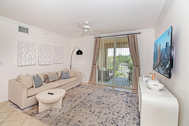 tiled living room featuring ceiling fan and ornamental molding