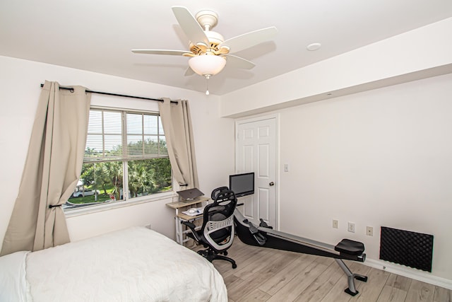 bedroom featuring ceiling fan and light hardwood / wood-style flooring