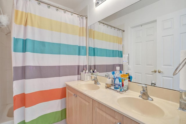 bathroom featuring independent shower and bath and vanity