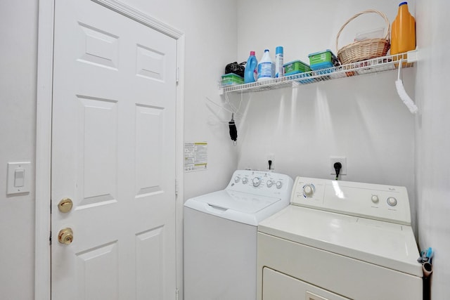 washroom with separate washer and dryer