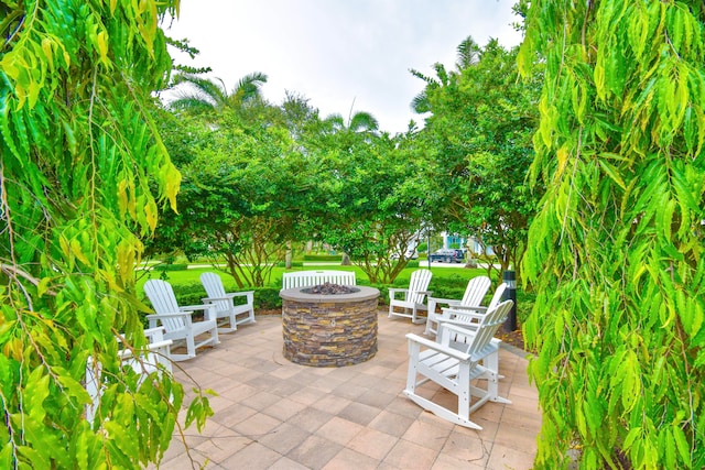 view of patio / terrace featuring a fire pit