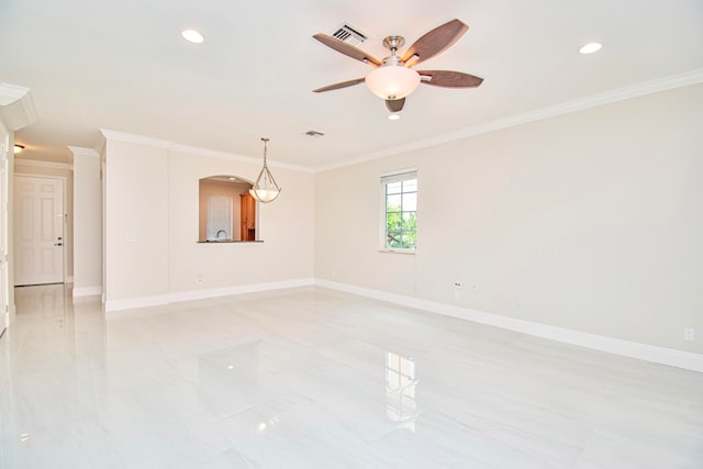 unfurnished room with crown molding and ceiling fan