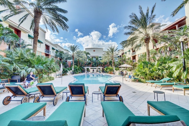 view of swimming pool with a patio area