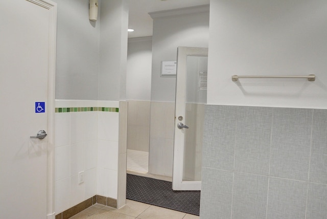 bathroom featuring tile walls and tile patterned flooring