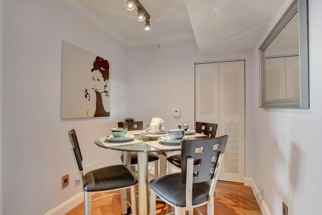 dining space featuring light wood-type flooring