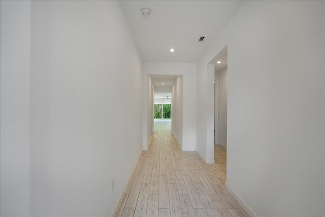 hallway featuring light wood-type flooring