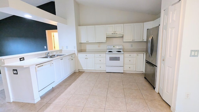 kitchen featuring light tile patterned floors, kitchen peninsula, white appliances, white cabinetry, and vaulted ceiling