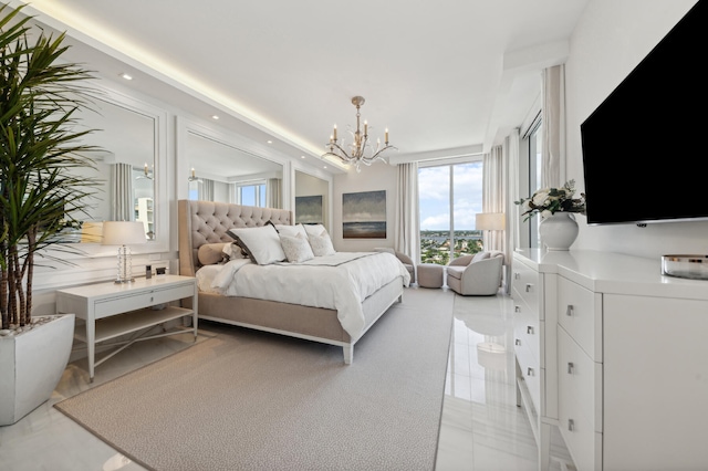 bedroom with a chandelier and light tile patterned floors