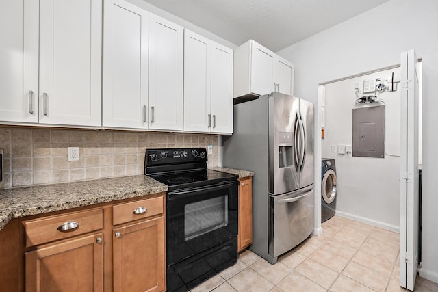 kitchen with white cabinets, electric panel, black electric range oven, stainless steel fridge, and stone countertops