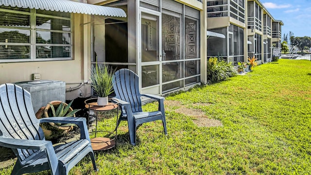 view of yard with central air condition unit