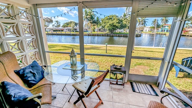 sunroom with a water view