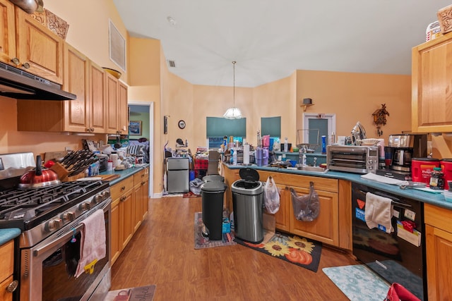 kitchen featuring stainless steel range, light hardwood / wood-style floors, extractor fan, and black dishwasher