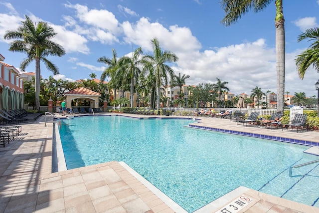 view of swimming pool with a gazebo and a patio