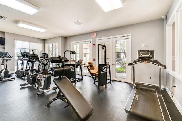 exercise room with french doors