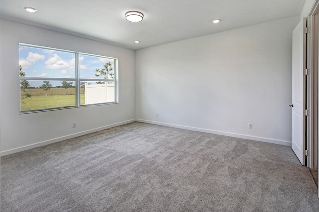 empty room with carpet flooring