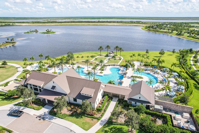 drone / aerial view with a water view