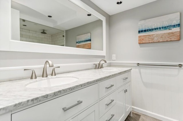 bathroom with vanity and walk in shower