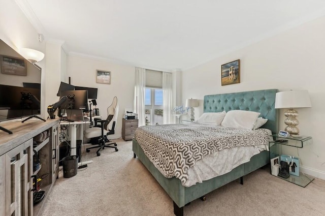 bedroom featuring crown molding and carpet floors