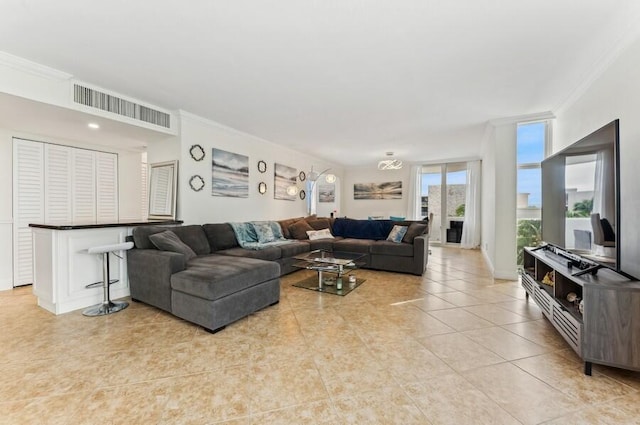 tiled living room with crown molding