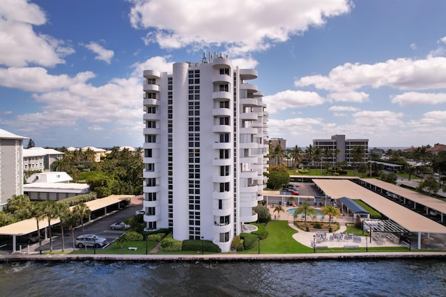 view of building exterior with a water view