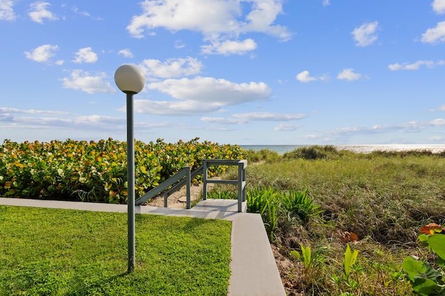 view of community with a water view