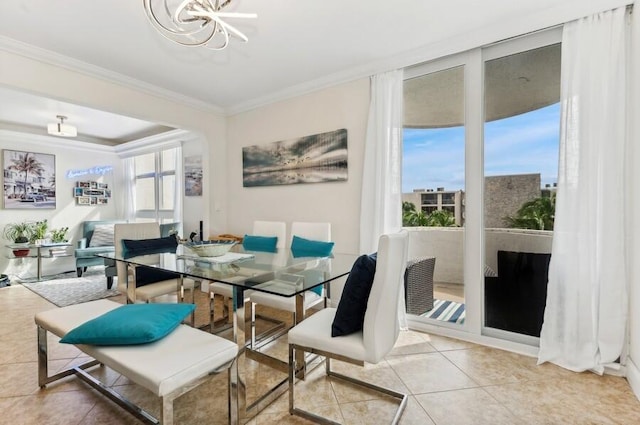 tiled dining area featuring ornamental molding