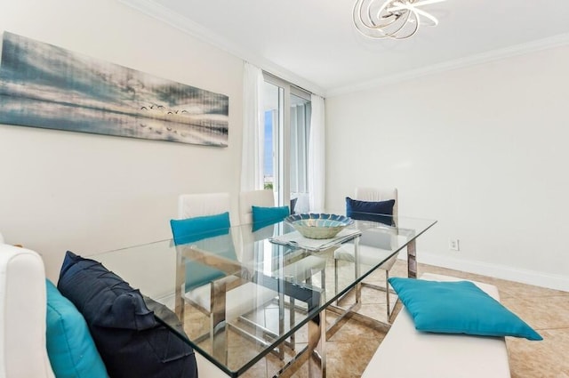 dining room featuring crown molding and light tile patterned floors