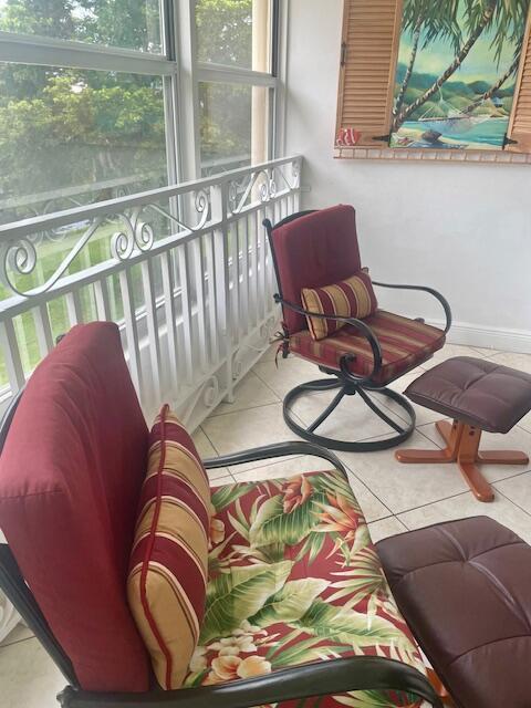 2700 Sunrise Lakes Dr W Unit 301, Sunrise, FL 33322 - sunroom / solarium with tile patterned floors and a healthy amount of sunlight