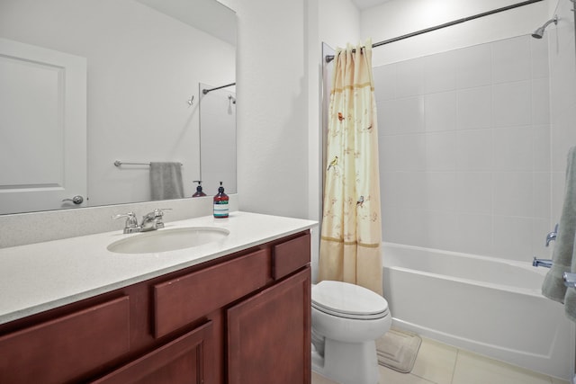 full bathroom featuring shower / bath combo with shower curtain, tile patterned flooring, vanity, and toilet