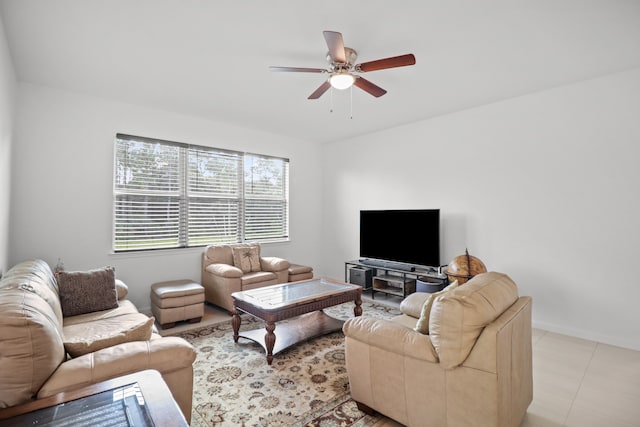 tiled living room featuring ceiling fan