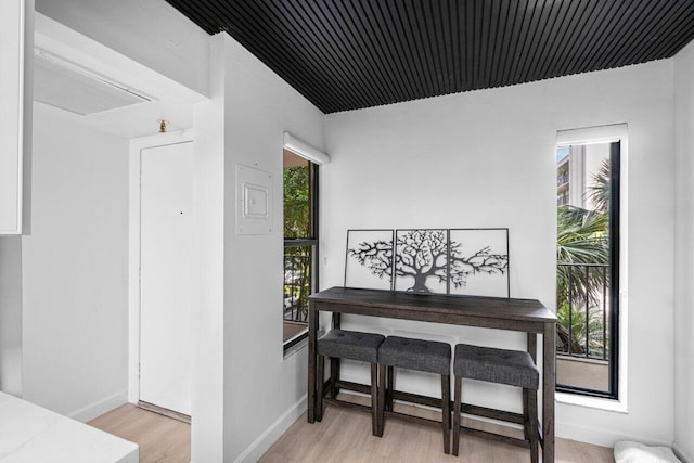 dining space featuring light wood-type flooring