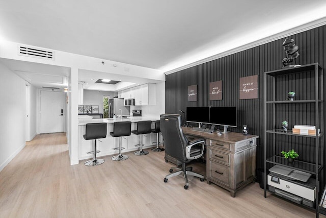 office area featuring light wood-type flooring