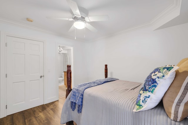 bedroom featuring connected bathroom, ceiling fan, ornamental molding, and hardwood / wood-style flooring