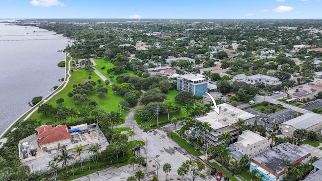 birds eye view of property featuring a water view