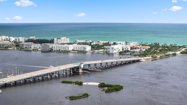 birds eye view of property featuring a water view