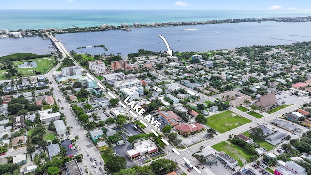 birds eye view of property featuring a water view