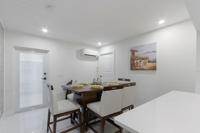 dining room featuring light tile patterned floors and a wall mounted AC