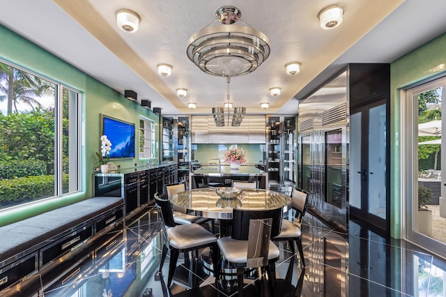 dining room with a chandelier