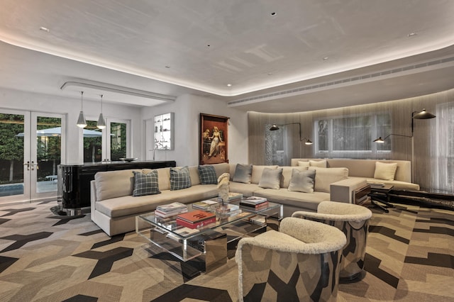 carpeted living room featuring french doors