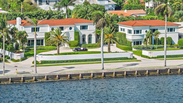 exterior space with a water view