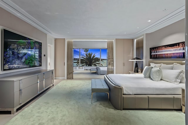 bedroom featuring light carpet and ornamental molding