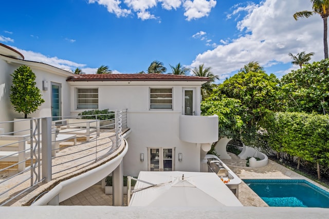 exterior space featuring a balcony