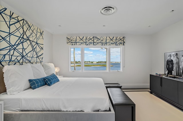 bedroom featuring hardwood / wood-style floors