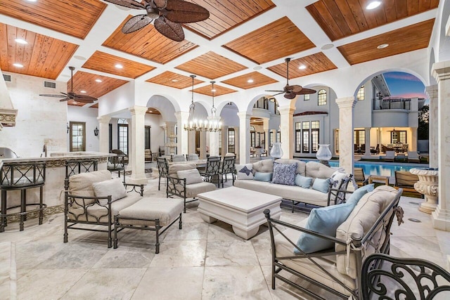 view of patio featuring an outdoor hangout area and ceiling fan