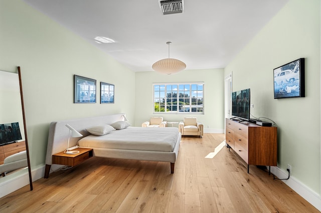 bedroom featuring light hardwood / wood-style floors